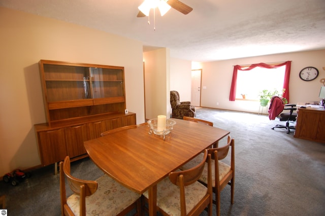 1137 Stoney Ridge Rd, West Branch, MI 48661 - dining room with carpet floors, a ceiling fan, and a desk