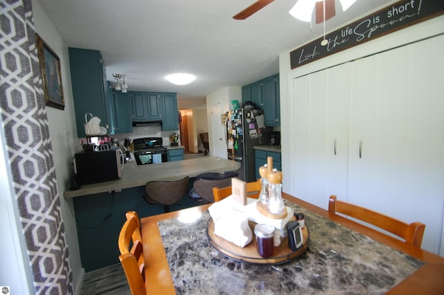 1137 Stoney Ridge Rd, West Branch, MI 48661 - dining area with ceiling fan