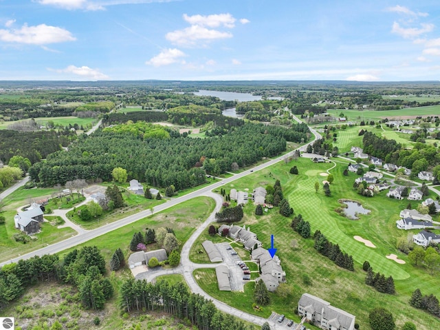 2683 Green Meadows Dr Unit 10, Traverse City, MI 49685 - aerial view of property's location with a nearby body of water, a local golf course, and a tree filled landscape