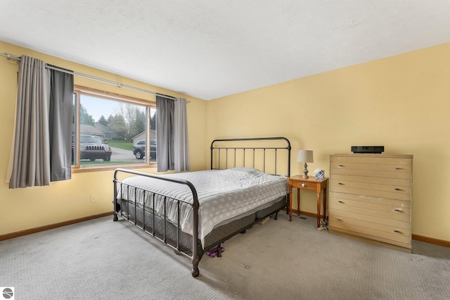 2683 Green Meadows Dr Unit 10, Traverse City, MI 49685 - carpeted bedroom with baseboards