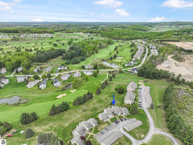 2683 Green Meadows Dr Unit 10, Traverse City, MI 49685 - aerial perspective of suburban area with a nearby body of water and a golf course