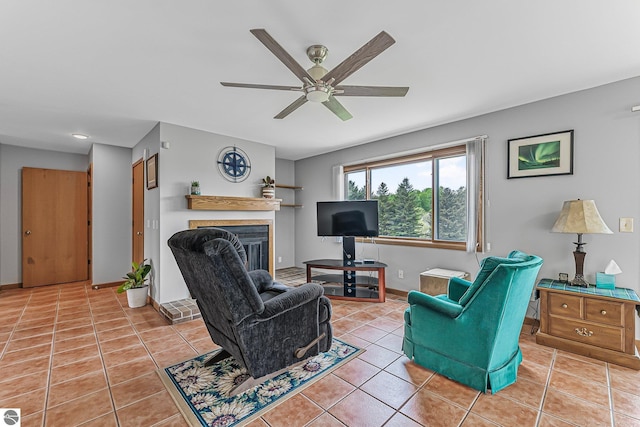 2683 Green Meadows Dr Unit 10, Traverse City, MI 49685 - living room with ceiling fan, a glass covered fireplace, light tile patterned flooring, baseboards, and recessed lighting