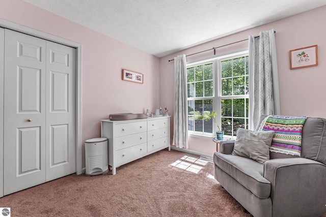 4667 Arbor Latch, Traverse City, MI 49685 - living area featuring light colored carpet and a textured ceiling