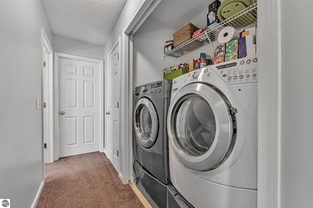 4667 Arbor Latch, Traverse City, MI 49685 - laundry room with carpet floors, a textured ceiling, baseboards, and washing machine and dryer