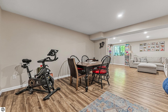4667 Arbor Latch, Traverse City, MI 49685 - dining space with wood finished floors, baseboards, and recessed lighting