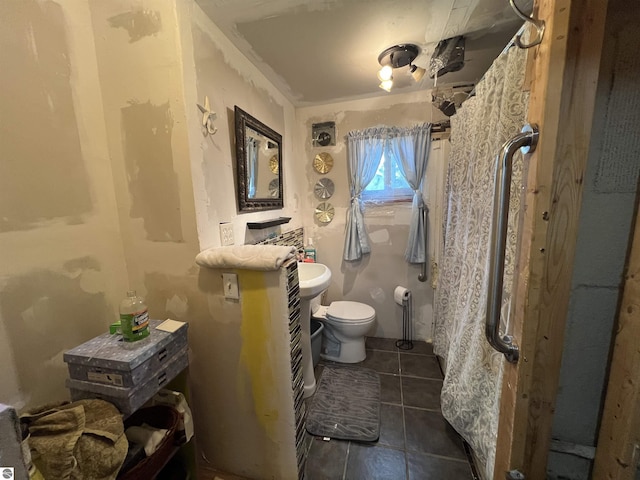 6993 E 34th Rd, Cadillac, MI 49601 - bathroom featuring toilet and tile patterned floors