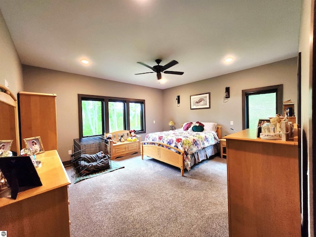 6238 E Gallivan Rd, Cedar, MI 49621 - carpeted bedroom with multiple windows, recessed lighting, and ceiling fan