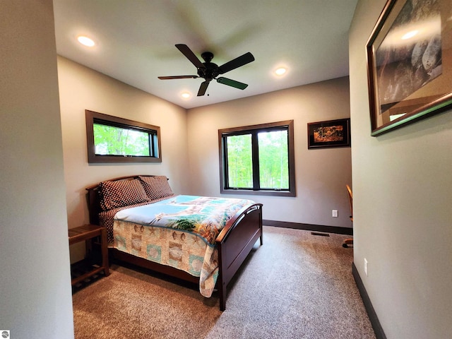6238 E Gallivan Rd, Cedar, MI 49621 - bedroom with carpet floors, baseboards, recessed lighting, and ceiling fan