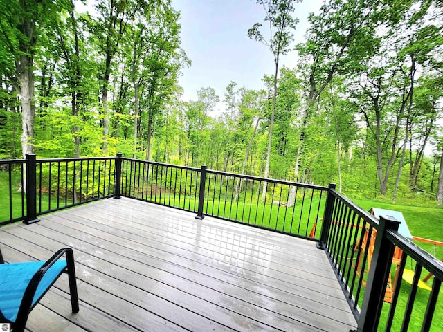 6238 E Gallivan Rd, Cedar, MI 49621 - deck featuring a lawn