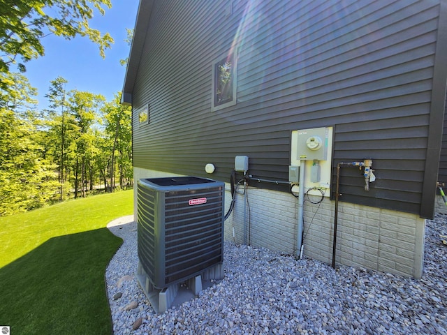 6238 E Gallivan Rd, Cedar, MI 49621 - exterior view of cooling unit and electric meter
