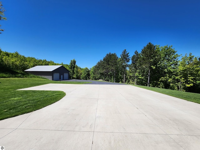 6238 E Gallivan Rd, Cedar, MI 49621 - view of concrete driveway