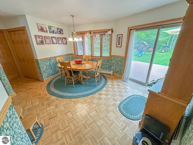 4809 N Alamando Rd, Coleman, MI 48618 - dining area featuring a chandelier and wainscoting