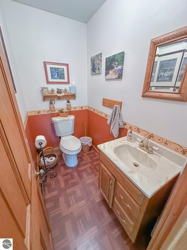 4809 N Alamando Rd, Coleman, MI 48618 - half bathroom with toilet and vanity