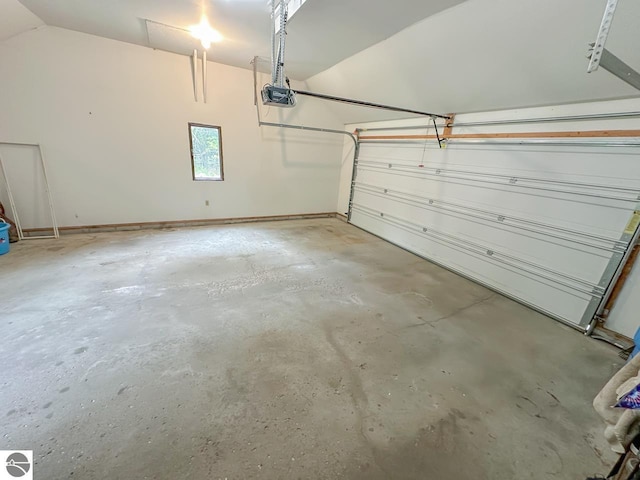 4809 N Alamando Rd, Coleman, MI 48618 - garage with a garage door opener