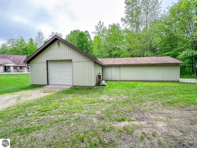 4809 N Alamando Rd, Coleman, MI 48618 - garage featuring driveway