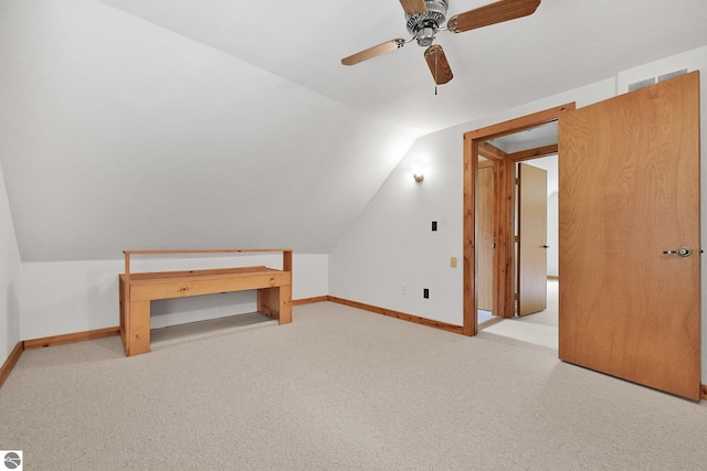 2460 E 26th Rd, Cadillac, MI 49601 - bonus room with lofted ceiling, baseboards, a ceiling fan, and carpet