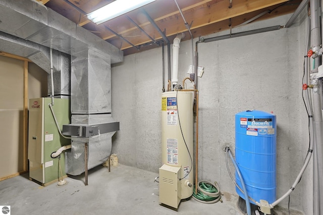 2460 E 26th Rd, Cadillac, MI 49601 - utility room featuring water heater