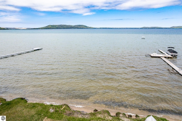 5434 W Macfarlane Rd, Glen Arbor, MI 49636 - water view featuring a dock