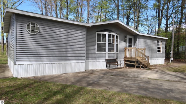 120 Lorna Ln, Roscommon, MI 48653 - manufactured / mobile home with a patio
