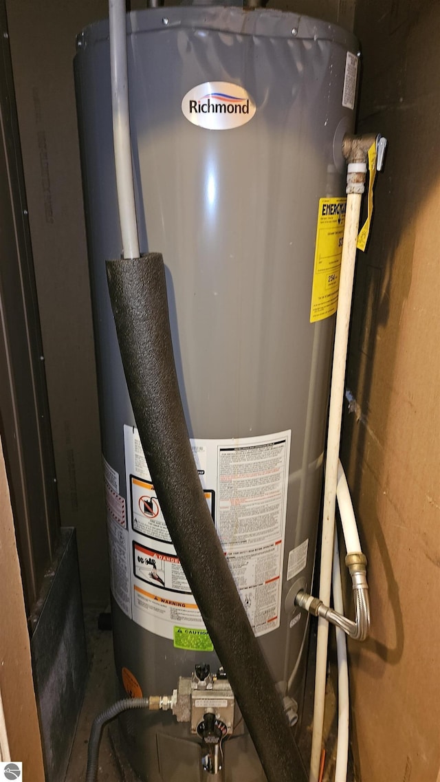 120 Lorna Ln, Roscommon, MI 48653 - utility room featuring water heater
