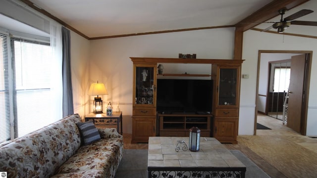 120 Lorna Ln, Roscommon, MI 48653 - living room featuring a ceiling fan, plenty of natural light, ornamental molding, and lofted ceiling