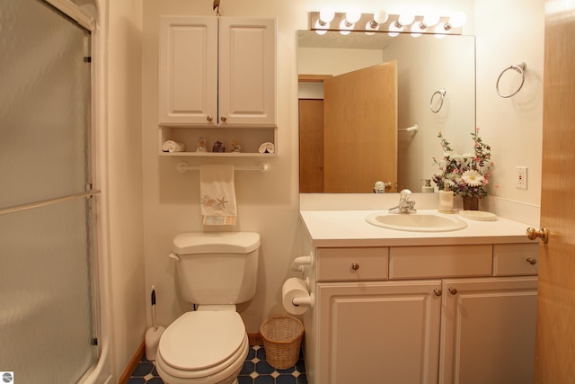 1162 Hemingway Ln, Traverse City, MI 49686 - bathroom with vanity, a stall shower, and toilet
