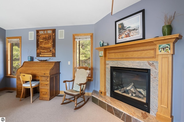 11896 Cabana Shores Rd, Williamsburg, MI 49690 - office featuring a glass covered fireplace, baseboards, and carpet flooring