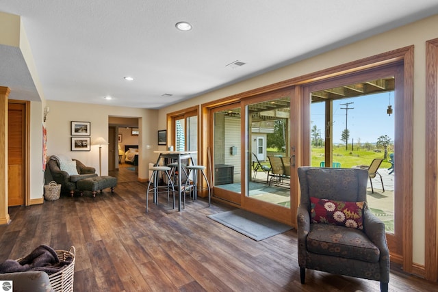 11896 Cabana Shores Rd, Williamsburg, MI 49690 - sitting room with wood finished floors, recessed lighting, and baseboards