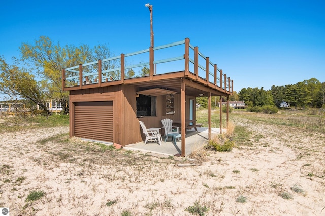 11896 Cabana Shores Rd, Williamsburg, MI 49690 - view of outbuilding featuring a garage