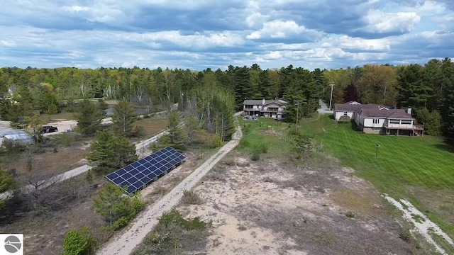 11896 Cabana Shores Rd, Williamsburg, MI 49690 - view of subject property with a forest