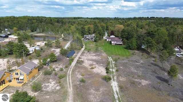 11896 Cabana Shores Rd, Williamsburg, MI 49690 - aerial view of property and surrounding area with a heavily wooded area