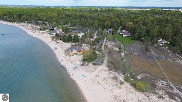 11896 Cabana Shores Rd, Williamsburg, MI 49690 - aerial view of property and surrounding area featuring a forest and a large body of water