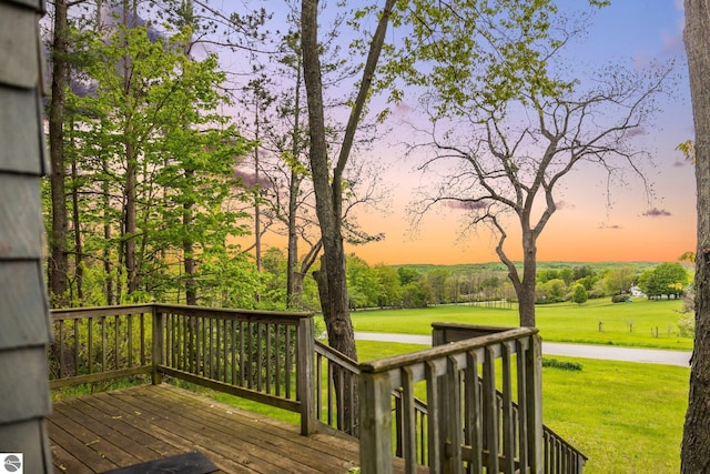 6675 Walker St, Benzonia, MI 49616 - wooden deck featuring a yard