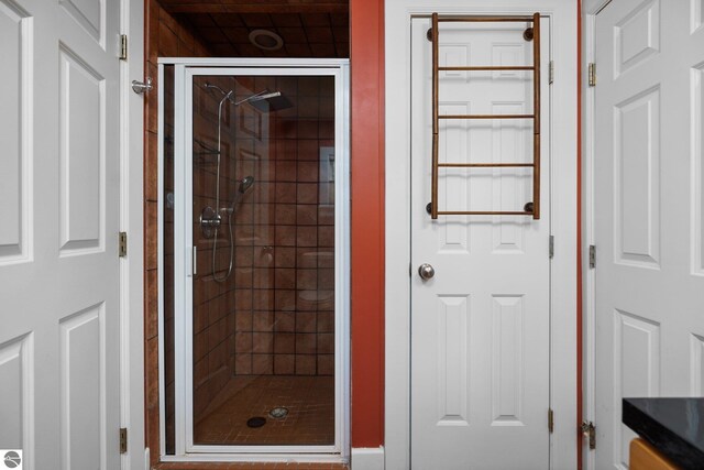 6675 Walker St, Benzonia, MI 49616 - full bathroom featuring a stall shower