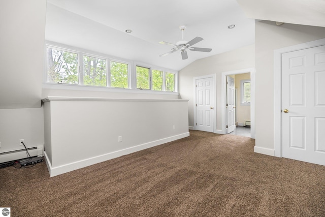 6675 Walker St, Benzonia, MI 49616 - unfurnished bedroom featuring carpet, vaulted ceiling, baseboards, a baseboard radiator, and a baseboard heating unit