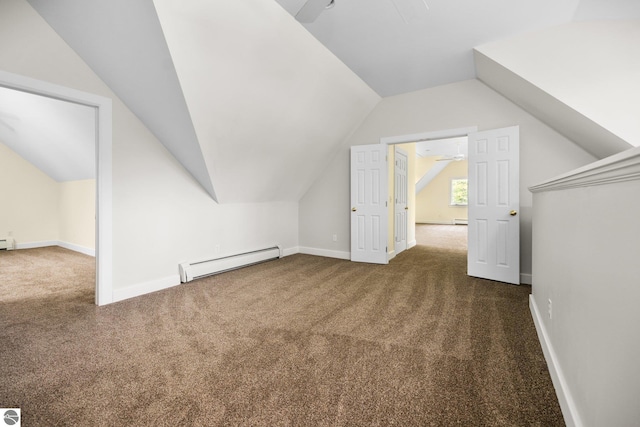 6675 Walker St, Benzonia, MI 49616 - bonus room with a baseboard heating unit, carpet, lofted ceiling, baseboards, and a wall unit AC
