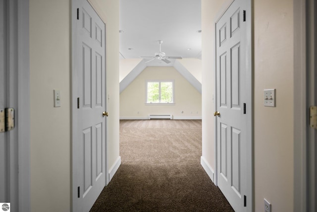 6675 Walker St, Benzonia, MI 49616 - hallway featuring carpet floors, baseboard heating, baseboards, and lofted ceiling
