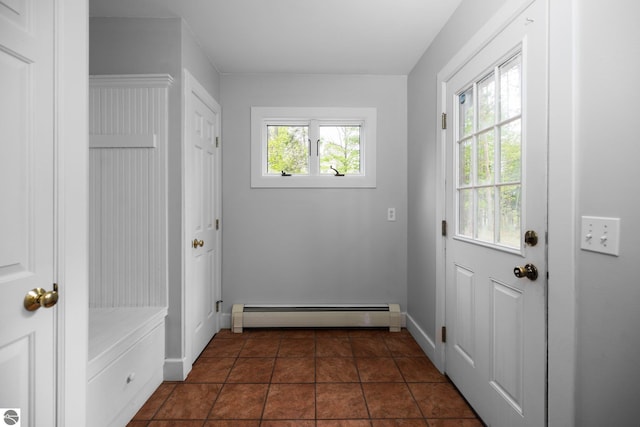 6675 Walker St, Benzonia, MI 49616 - entryway with baseboard heating and baseboards