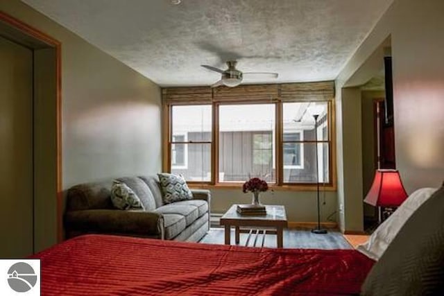 2401 J Maddy Pkwy, Interlochen, MI 49643 - bedroom featuring wood finished floors and baseboards