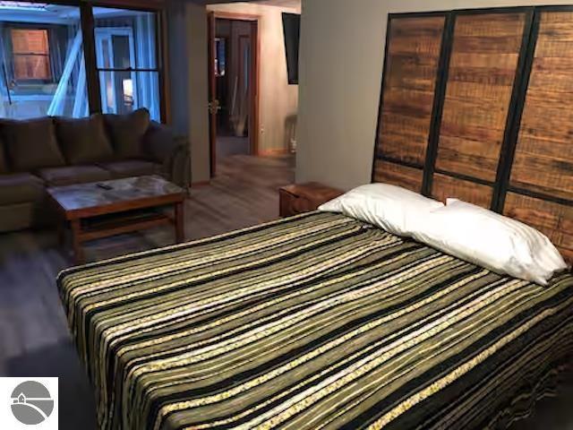 2401 J Maddy Pkwy, Interlochen, MI 49643 - bedroom featuring wood finished floors