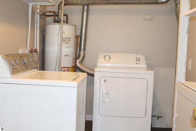 1023 S Elizabeth St, Mount Pleasant, MI 48858 - washroom with washer and dryer and water heater
