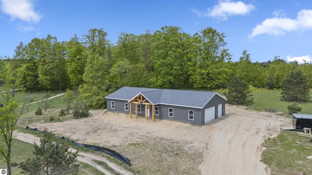 11285 Lakeshore Dr, Buckley, MI 49620 - aerial view of property and surrounding area with a forest