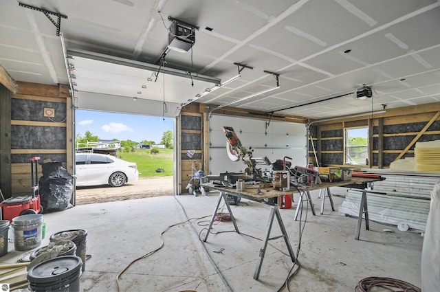 11285 Lakeshore Dr, Buckley, MI 49620 - garage featuring a garage door opener