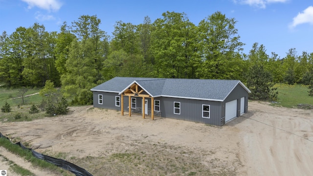 11285 Lakeshore Dr, Buckley, MI 49620 - view of front facade with a detached garage