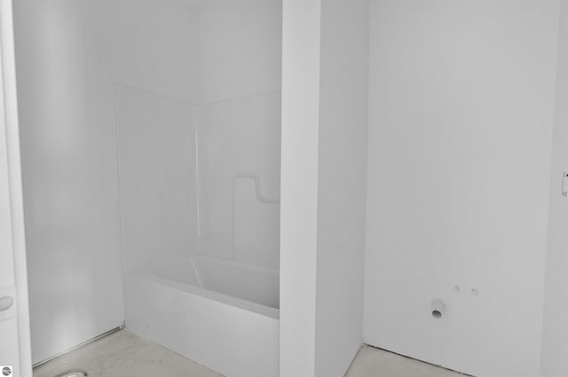 11285 Lakeshore Dr, Buckley, MI 49620 - full bathroom featuring concrete flooring and shower / washtub combination