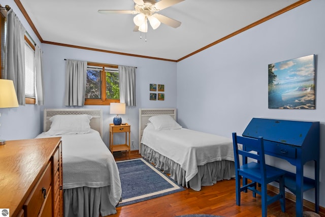 906 Michigan Ave, Frankfort, MI 49635 - bedroom featuring crown molding, wood finished floors, and ceiling fan
