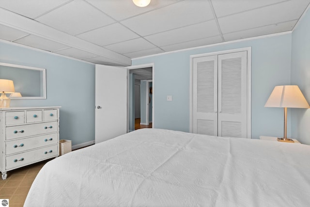 906 Michigan Ave, Frankfort, MI 49635 - bedroom with a closet and a drop ceiling