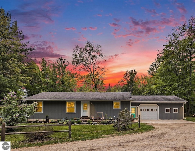 6313 E 34 1/2 Rd, Cadillac, MI 49601 - single story home with driveway and a garage