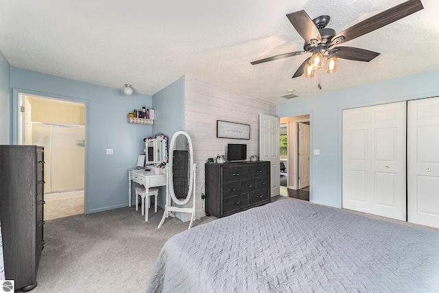 6313 E 34 1/2 Rd, Cadillac, MI 49601 - carpeted bedroom with wood walls, ceiling fan, a textured ceiling, a closet, and baseboards