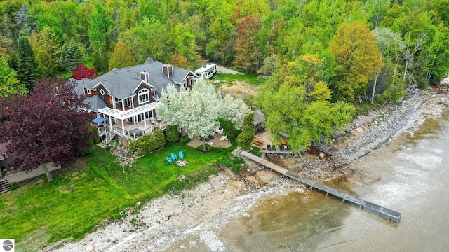 6853 S W Bay Shore Dr, Traverse City, MI 49684 - view from above of property featuring a heavily wooded area and a large body of water